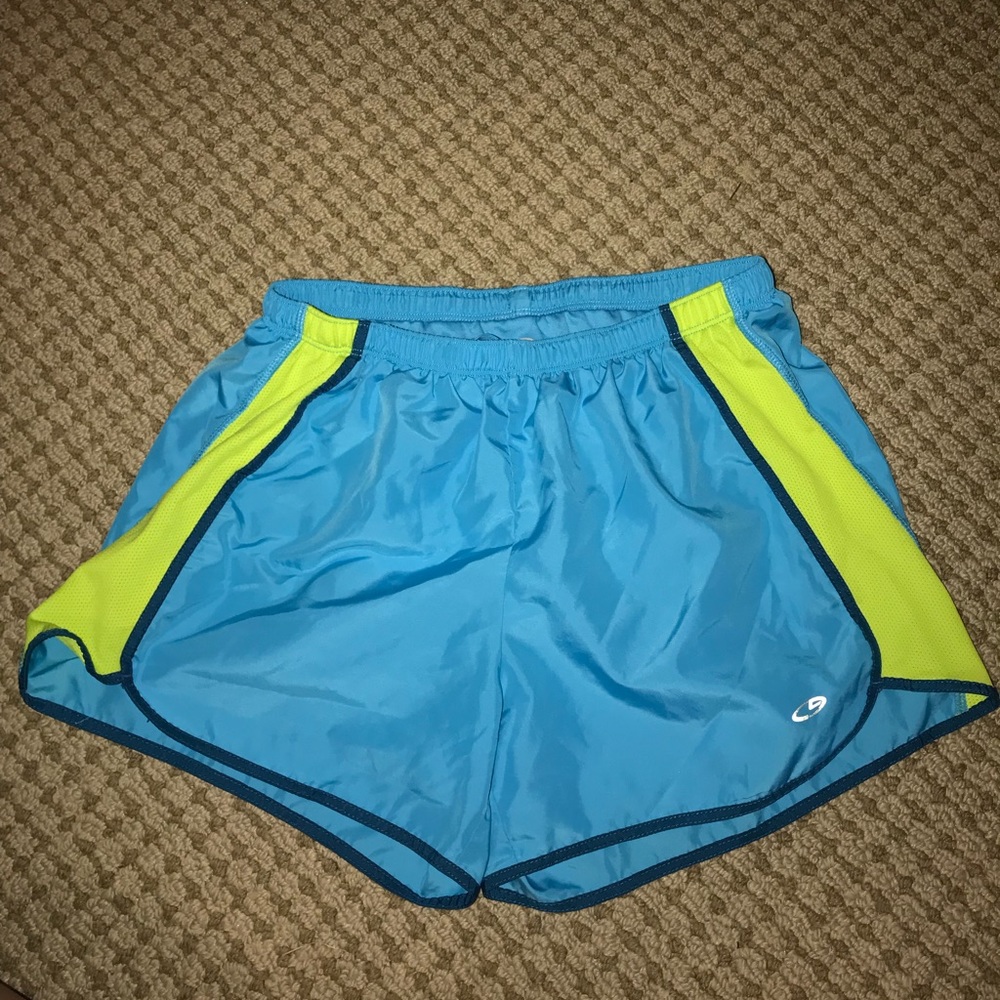 Teal and lime green Champion athletic shorts